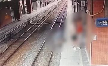 疑父母疏忽未握緊把手...嬰兒車突滑落鐵軌 2歲...