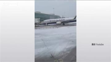 英國入冬首場暴雪！機場航班亂、駕駛困風雪中