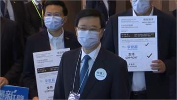 李家超無懸念當選香港特首 獲99.2%支持率