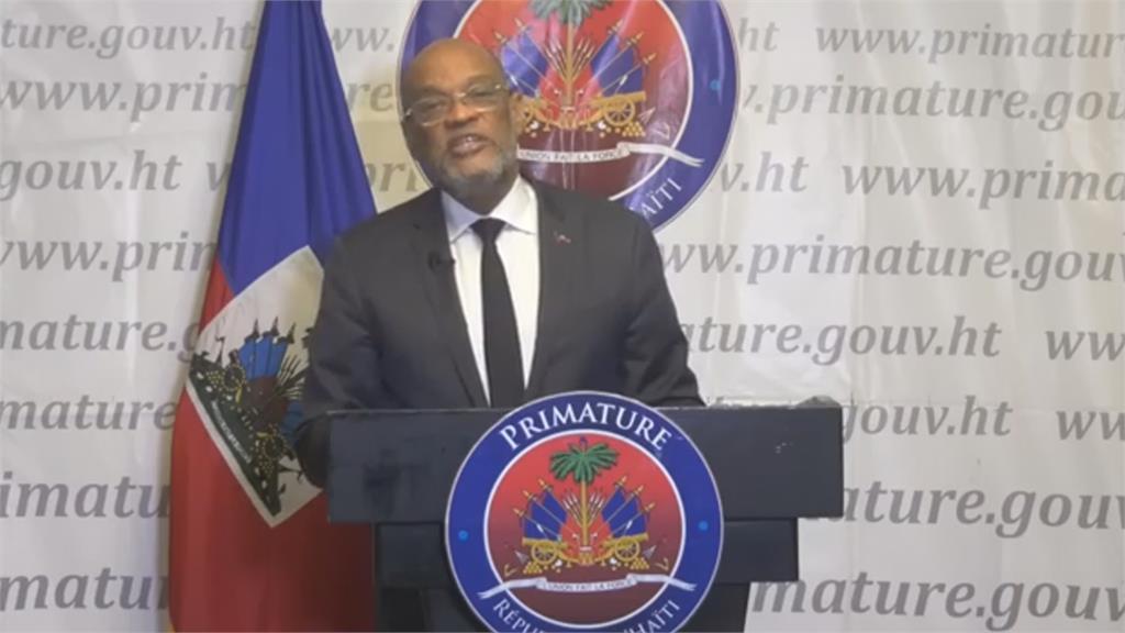 海地總理兼總統亨利，不敵海內外壓力宣布請辭。圖／畫面攝自AP