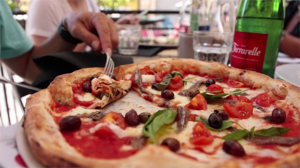 義大利民眾不買單美式披薩，認為道地口味才是真理。圖／路透社